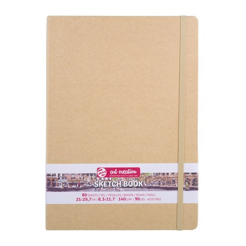 Sketchbook with kraft paper cover and visible brand label on a white background