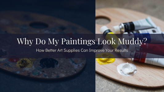 Art supplies on a painting table with brushes, paint tubes, and watercolor paper