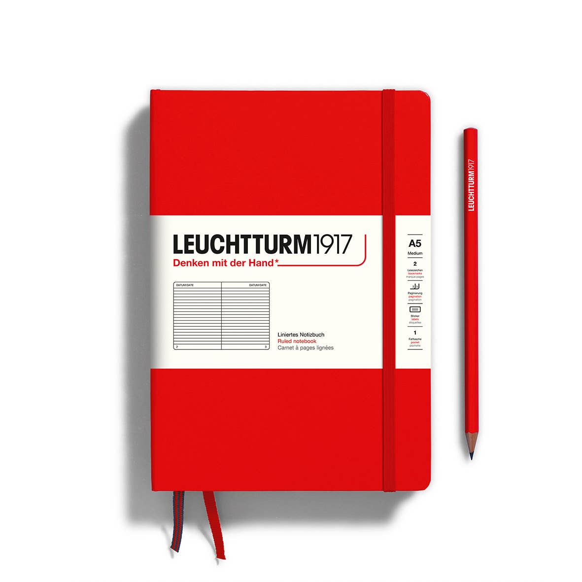 Red notebook with white label featuring 'Leuchtturm1917' on a white background
