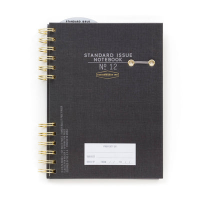 Black notebook with gold spiral binding on a white background