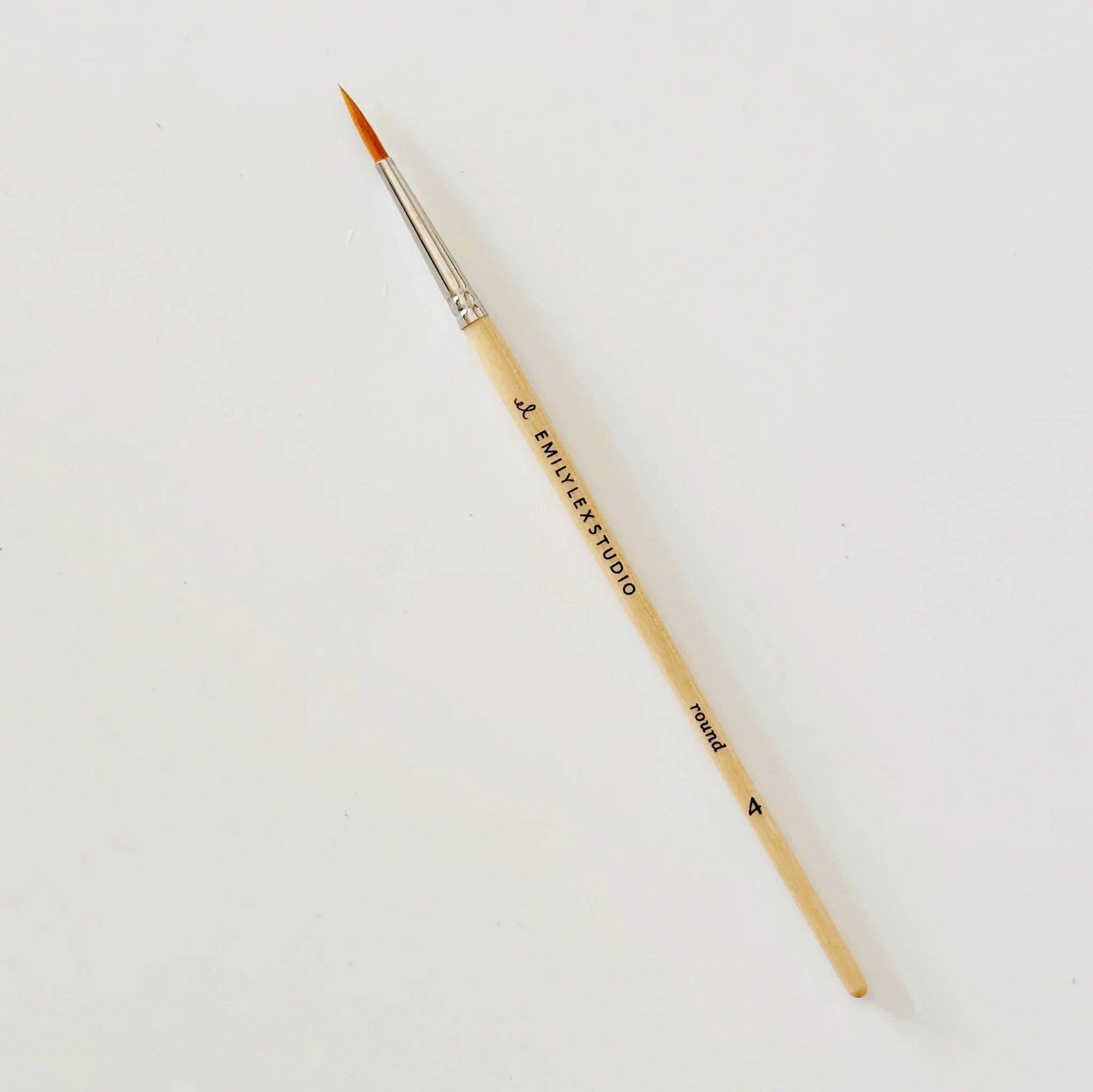 Paintbrush with a visible brand name on a white background