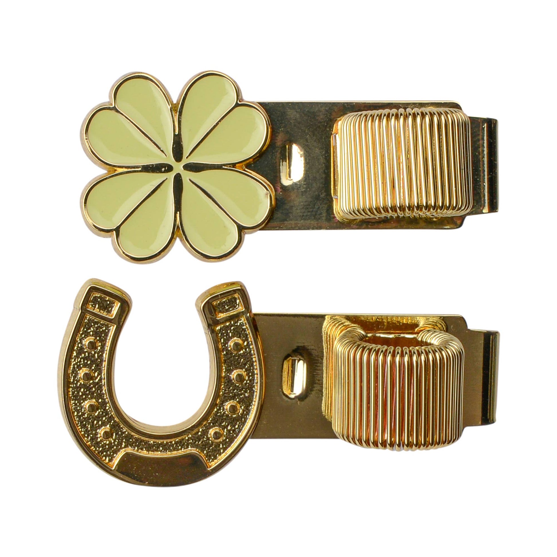 Gold four-leaf clover and horseshoe clip on a white background
