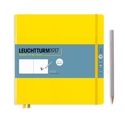 Yellow notebook with blue label and a pencil on a white background