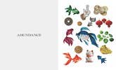 Collection of various small figurines on a white background