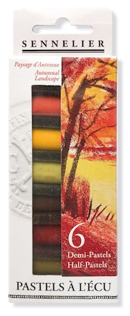 A collection of extra-soft pastel half sticks in various colors, presented in a cardboard set with the text 'Paris Collection' on the packaging.