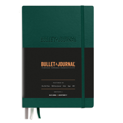 Green and black bullet journal with 'Bullet Journal' branding on a white background