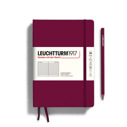Maroon notebook with white label featuring 'Leuchtturm1917' branding on a white background