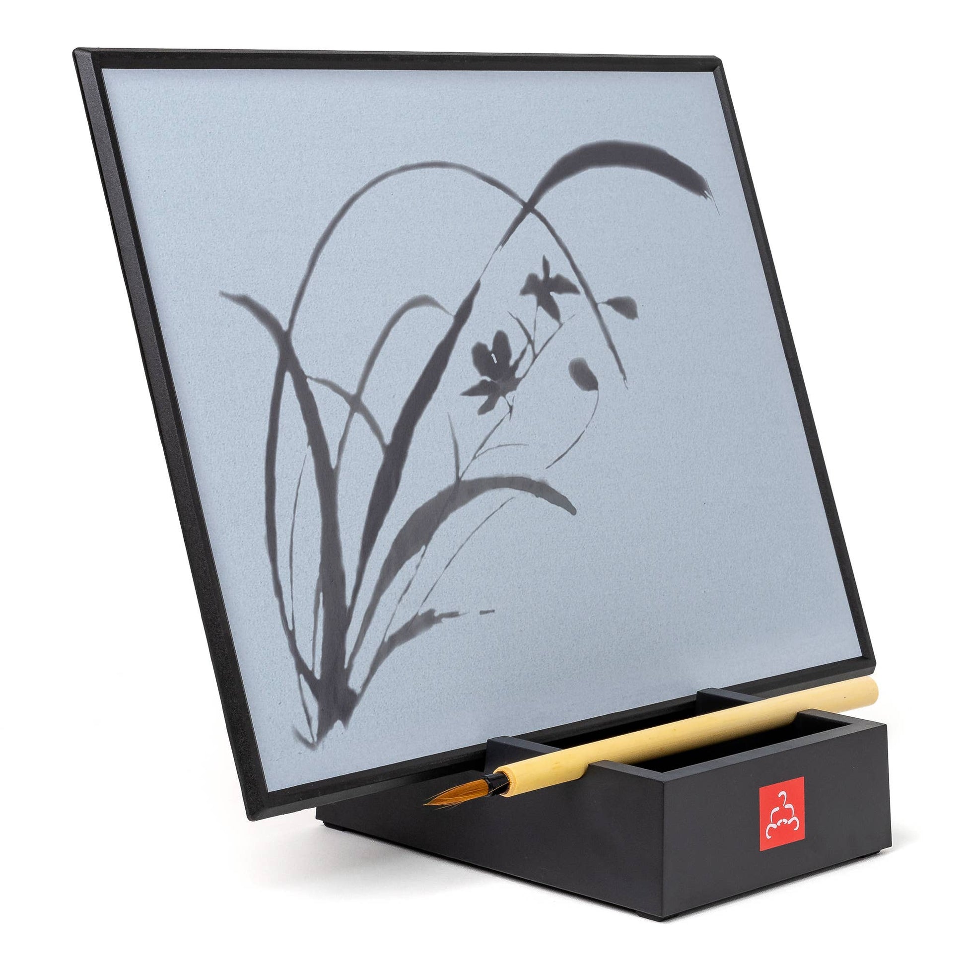 Tablet with stylus on a stand displaying a floral drawing on a light gray background