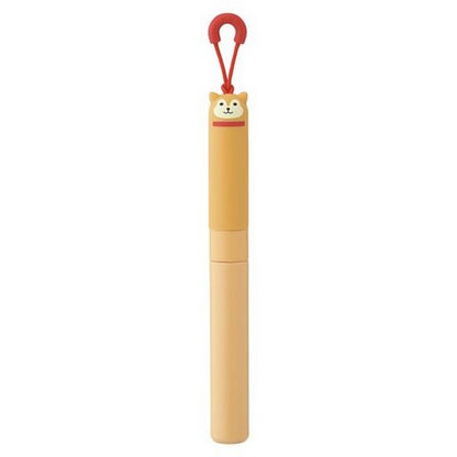 A pair of Punilabo stick scissors with a beige and orange color scheme, featuring a spring-assisted mechanism and a loop for a lanyard or keyring.