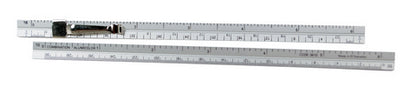 Two metal rulers stacked on top of each other