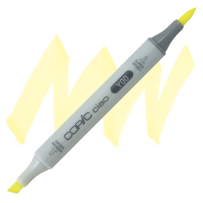 A double-ended Copic Ciao marker with a super brush tip on one end and a medium broad tip on the other, with a yellow cap on the end.
