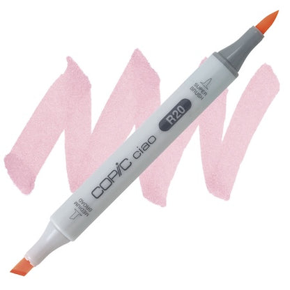 A double-ended Copic Ciao marker with a blush color tip, shown with a pink swatch behind it.