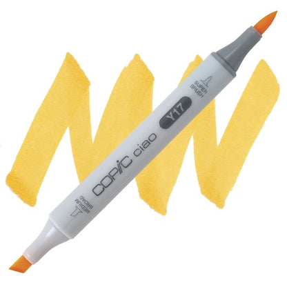 Copic Ciao marker in golden yellow with a super brush tip and a medium broad tip combo, shown with a yellow background.
