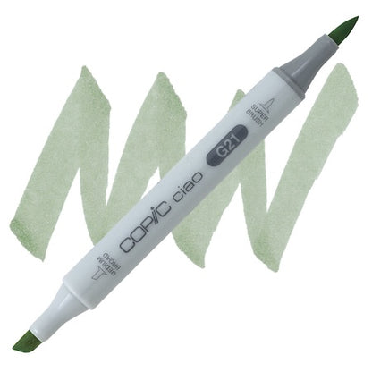 A Copic Ciao marker in lime green color with a double-ended design and a brush tip on one end.