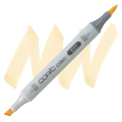 A Copic Ciao marker with a milky white ink pad and a brush tip on one end, with the brand name and product model visible.