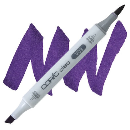 A Copic Ciao marker in violet color with a double-ended design, showing the tip and the barrel on a white background.