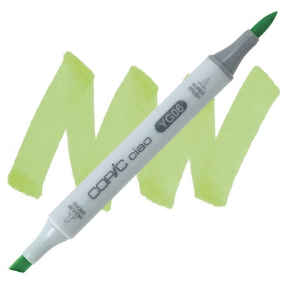 Copic Ciao marker with a yellowish green tip, displayed on a white background with a green rectangle behind it.