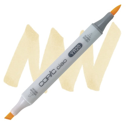 A Copic Ciao marker in a yellowish shade color with a double-ended design, showing the cap and the yellowish shade of the ink.
