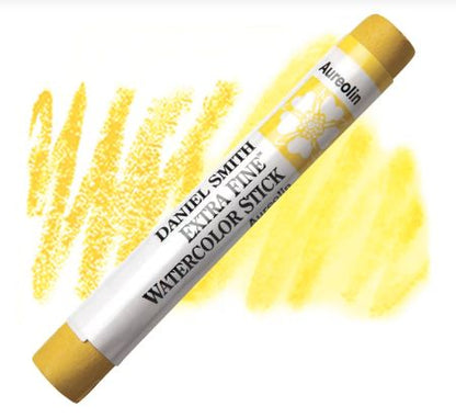 Yellow watercolor paint stick with visible brand name on a white background