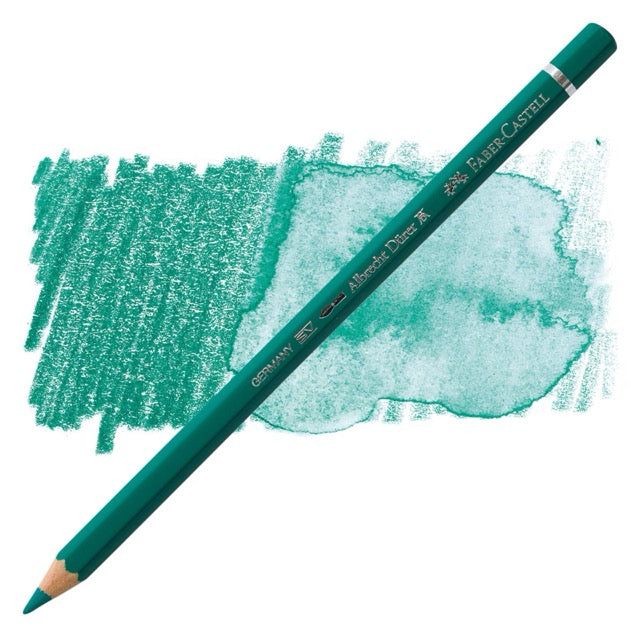 Green colored pencil with a sample of color on a white background