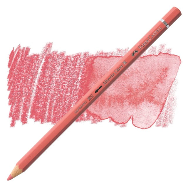 Red colored pencil with a sample of red color swatch on a white background