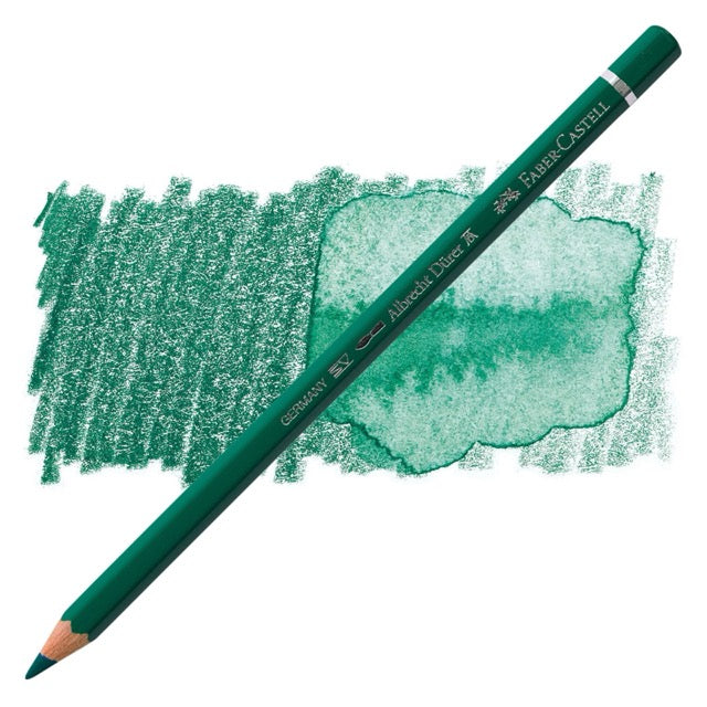 Green colored pencil with a sample of green color swatch on a white background