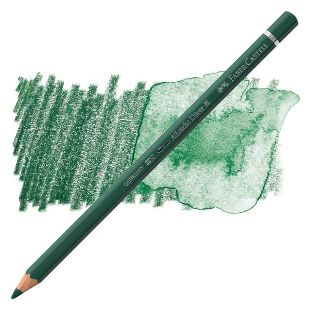 Green colored pencil with samples of green color on a white background