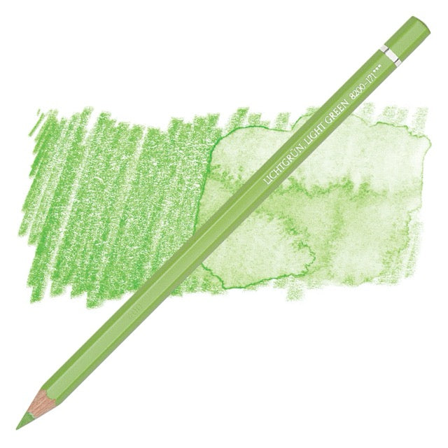 Green colored pencil with a sample of green color on a white background