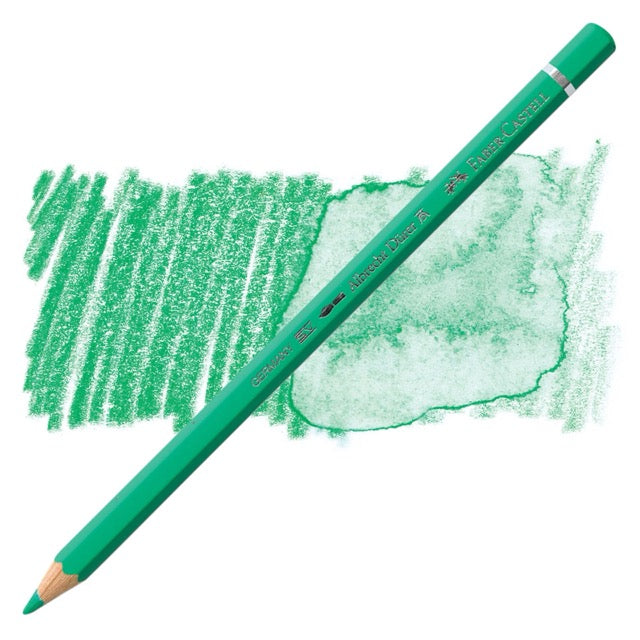 Green colored pencil with a sample of green color swatch on a white background