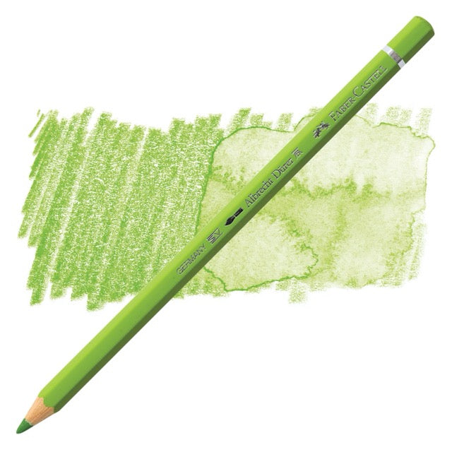 Green colored pencil with a sample of green color swatch on a white background
