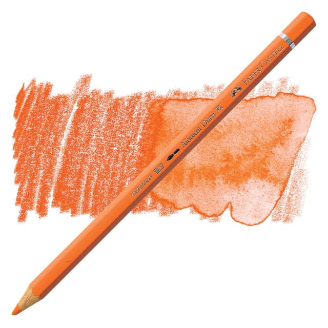 Orange colored pencil with a sample of color swatch on a white background