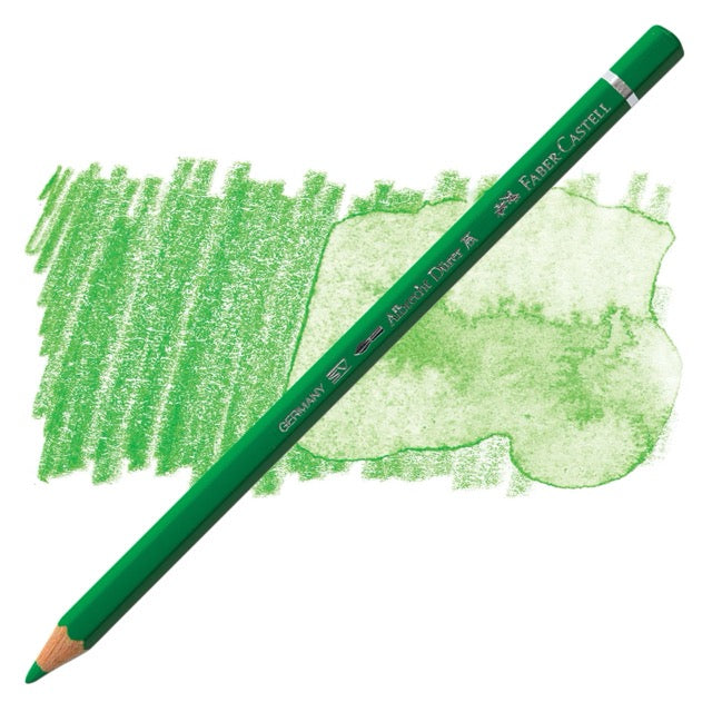 Green colored pencil with a sample of green color swatch on a white background