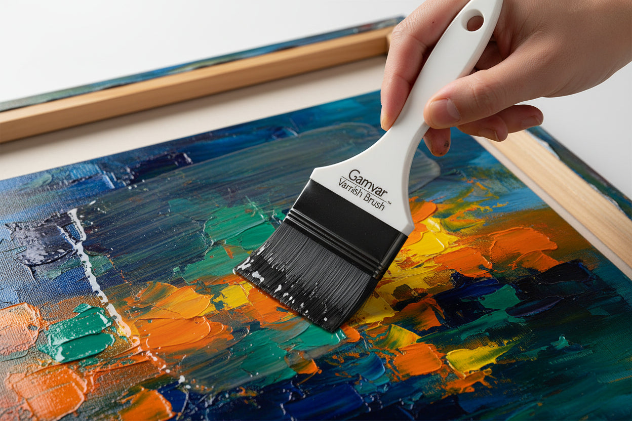 Artist applying varnish to an oil painting with a varnish brush