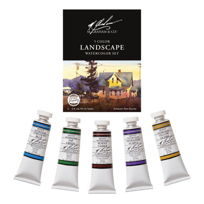 Set of five landscape watercolor tubes with a box in the background
