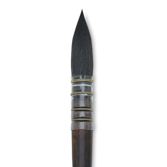 Artistic brush with wooden handle and black bristle head on a white background