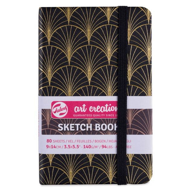 Sketchbook with gold geometric pattern on black cover, featuring Talens Art Creation branding.