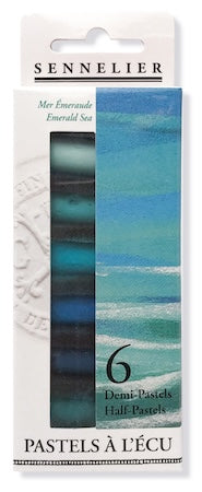 A collection of extra-soft pastel half sticks in various colors, presented in a cardboard set with the text 'Paris Collection' on the packaging.