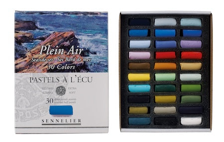 A collection of extra-soft pastel half sticks in various colors, presented in a cardboard set with the text 'Paris Collection' on the packaging.