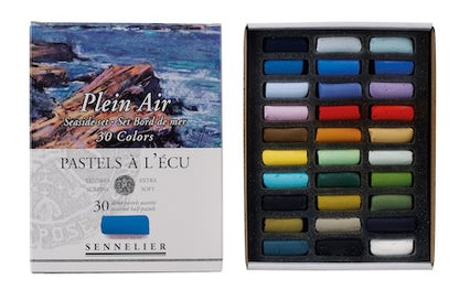 A collection of extra-soft pastel half sticks in various colors, presented in a cardboard set with the text 'Paris Collection' on the packaging.