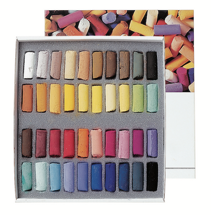 A collection of extra-soft pastel half sticks in various colors, presented in a cardboard set with the text 'Paris Collection' on the packaging.