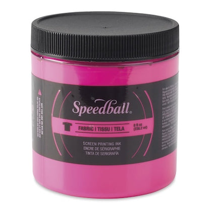 A jar of Speedball Fabric Screen Printing Inks in blue color with a black lid, labeled with the brand and product details.