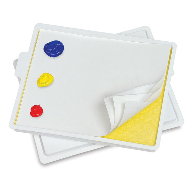 White dry erase boards with colorful markers on a white background