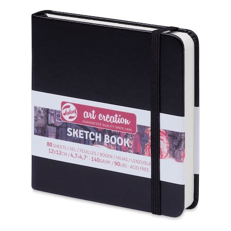 Black sketchbook with a visible brand label on a white background