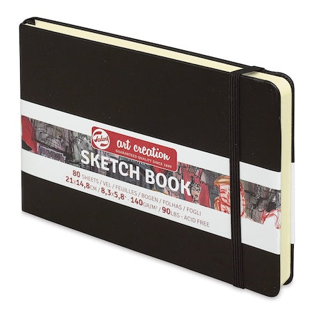 Black sketchbook with a visible label on a white background