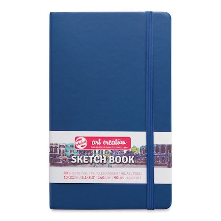 Blue sketchbook with a visible brand label on a white background