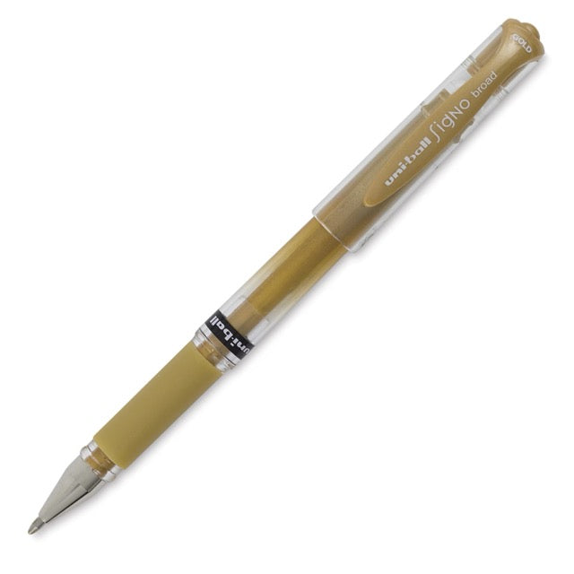 Ballpoint pen with beige barrel and clear grip on a white background