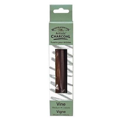 Packaging of Winsor & Newton Vine Charcoal Sticks, showing 12 charcoal sticks through a clear plastic window, with green labeling on the top.