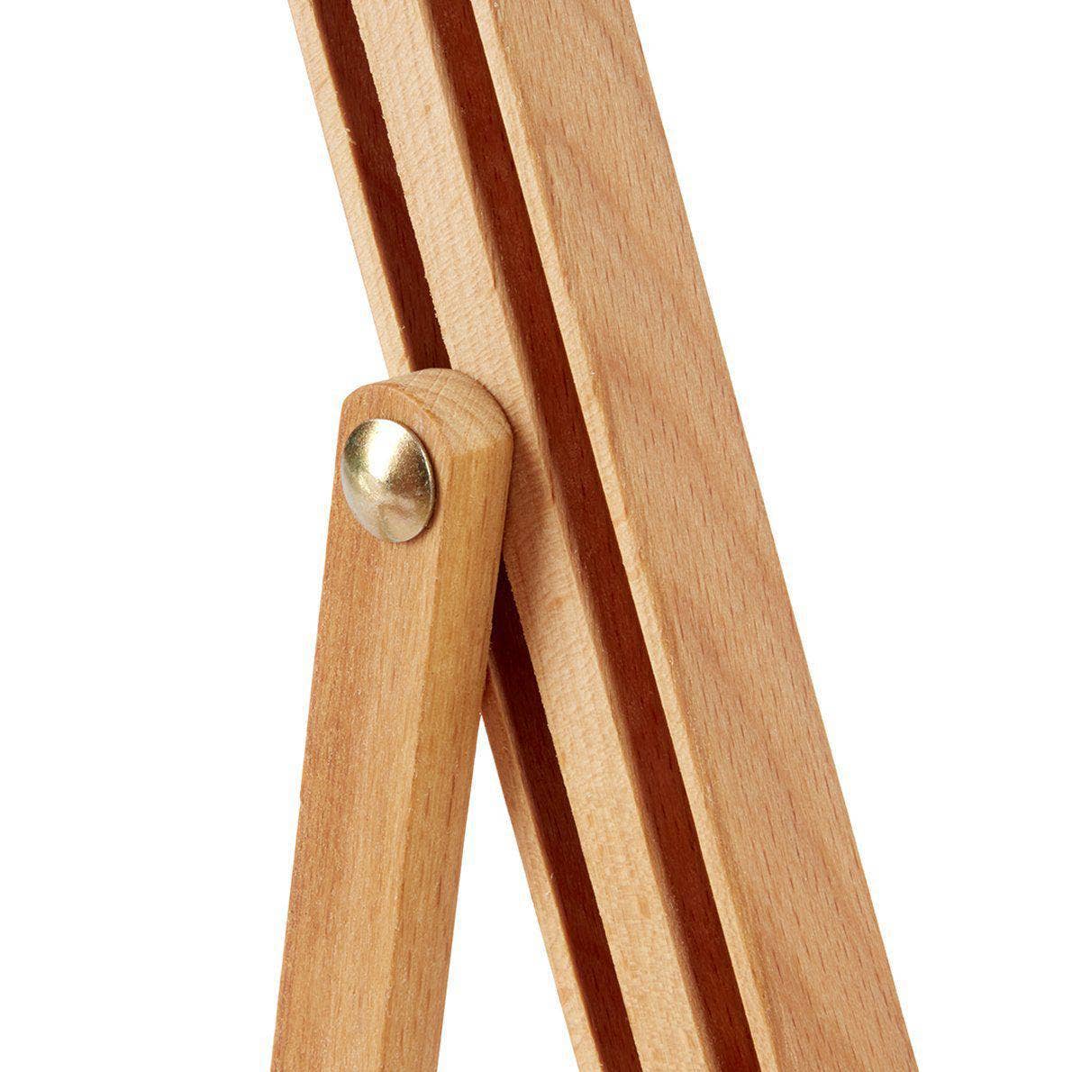Wooden stand with a gold knob on a white background