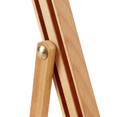 Wooden stand with a gold knob on a white background