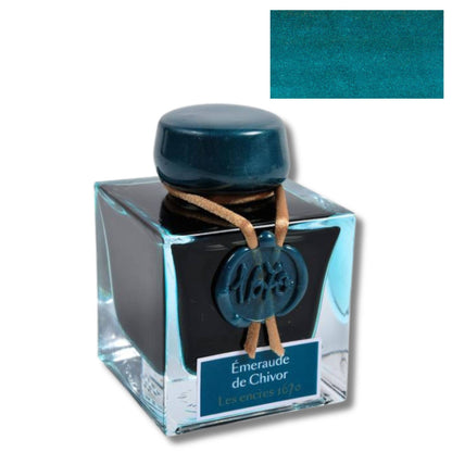 Ink bottle with blue cap and label on a white background